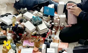 Vợ chồng giám đốc làm giả hàng chục nghìn chai nước hoa Gucci, Dior, YSL